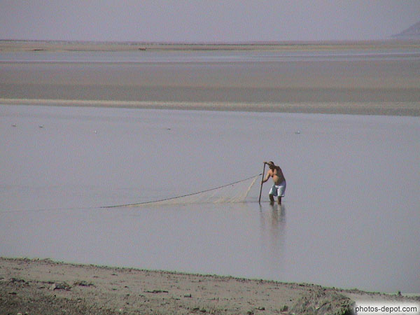photo de pêcheur baie du mont St Michel vue de la Roche Torin