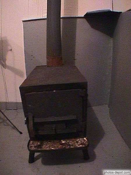 photo de poele a bois dans les cabanes sur glace