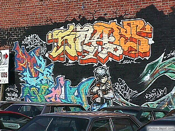 Jeune aux bras croisés sur parking Canada, Quebec, Photo 1998