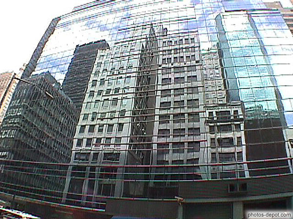 photo de reflets dans building en verre