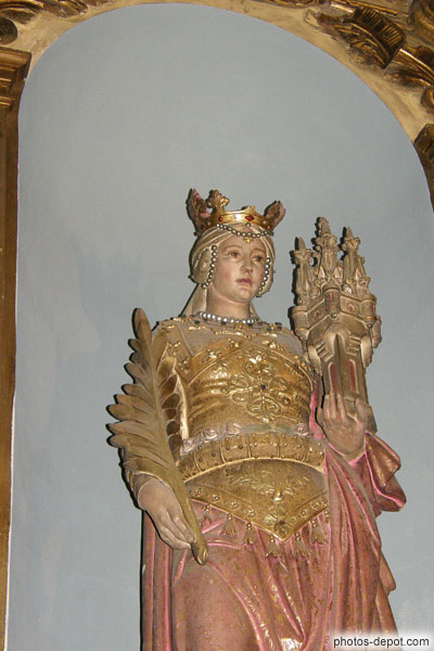 photo de sainte Barbe tenant la tour ou elle fut enfermée et la palme de son martyr