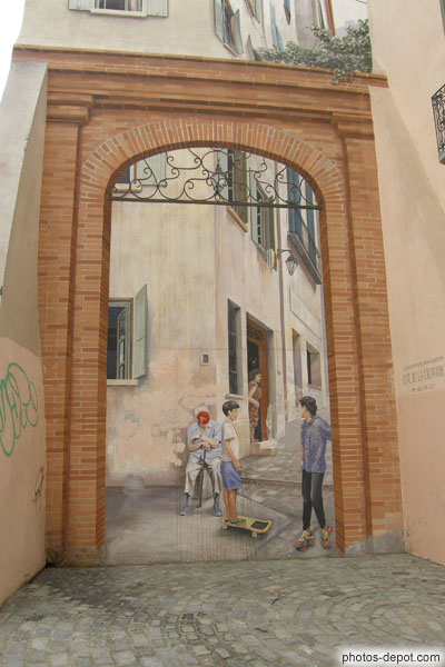 photo de peinture en trompe l'Oeil sur mur de maison