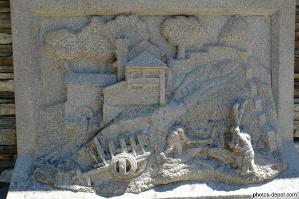 photo de bas relief représentant l'abbattage des blés et moulin