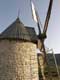 meunier enlevant les toiles des pales du moulin � vent / France, Cucugnan