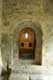 On pénètre dans l'abbaye depuis le cloître / France, Languedoc Roussillon, Prieure de Serrabone