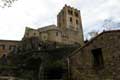 Originalement de 3 absides, une 4è abside fut ajoutée pour recevoir les reliques de St Gaudérique au XIe, la tour porche date de 1428 / France, Languedoc Roussillon, St Martin du Canigou