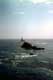 rochers et phare d�passant sortant de la mer / France, Bretagne, Lesconil